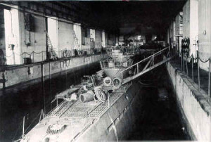 Interior of a pen at St. Nazaire in May 1945. One of the last from a fleet of 1,100 U-boats. 